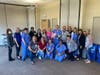 Yana Z., Mike Z. and baby Michael gather for a group picture with the team that saved Yana’s life from AFE and delivered baby Michael.