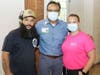 Barber Miguel Delvalle, Hartford HealthCare Region President Bimal Patel and Kelly Toth, APRN, system director of Neighborhood Health Operations, at the No Hair Left Behind event, where free haircuts and health screenings were provided.