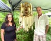 Next to a Native American Dream Catcher are Ruthanne Tickel-Logan and her husband, Dave Logan.