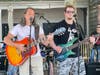 Musicians from the School of Rock (Newtown) entertain the crowds.