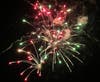 Fireworks burst over Tinicum Park.