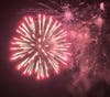 Fireworks burst over Tinicum Park.
