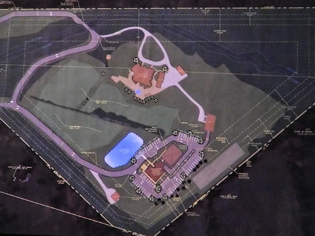 This shows the layout of the property with the entrances on Swamp Road, upper left, and the winery's main facility in the lower right.