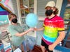 Tracy Lamb of Evolution Candy spent a busy evening making cotton candy to benefit Kin.