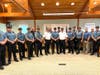 Chief John Hearn and members of the Newtown Township Police Department welcome Edward Grinberg to the force.