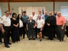 Edward Grinberg with family members, Chief John Hearn and the members of the board of supervisors.