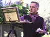 Luiz Vilela at his easel painting en plein air.