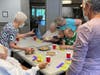 Pickering Manor Auxiliary's executive board members host a ‘Patio Lemonade Social’ for Personal Care Residents (moved indoors due to the heat).