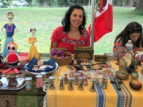 A volunteer at last year's event shares her Mexican culture.