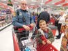 Officer Jules Ferraro participates in Shop With A Cop.
