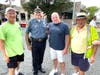 From left, Bill Sheffer with the Newtown Business Association, Newtown Borough Police Chief James Sabath, Newtown Township Police Chief John Hearn and NBA car show volunteer Paul Salvatore.
