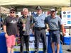 Gene Epstein accepts the Best of Show Award from Mayor John Burke, left, Police Chief James Sabath and show chair Dan Petty.
