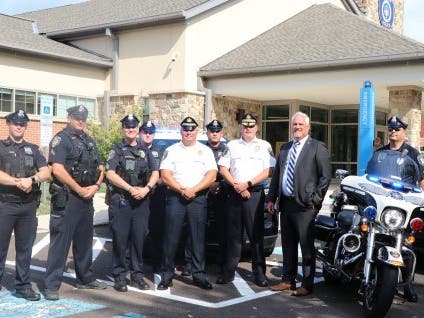 Bucks County District Attorney Matt Weintraub joins officers from the Warrington Township Police Department in announcing a Labor Day weekend DUI checkpoint.