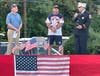 Newtown Fire Chief Glenn Forsyth remembers one of its heroes - Dave Pannepacker - who passed away in July. Looking on are Mayor John Burke and Bernie Sauer.