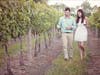 A couple strolls through a vineyard in Bucks County.