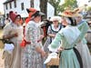 Colonial women at the autumn market.