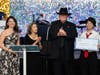 From left: Executive Director Christina McGinley, Gladys Mendieta White, Bob White and Student Emergency Fund award recipient Galilea Garcia-Gutierrez.
