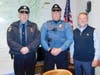 Newly-sworn Sgt. Sean Orr with Chief James Sabath, left, and Mayor John Burke, right.