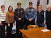 With Sgt. Sean Orr are, from left, council member Amy Lustig, Council President Tara Grunde-McLaughlin, Police Chief James Sabath, Sgt. Orr, Mayor John Burke and Councilman and former Mayor Dennis O'Brien.