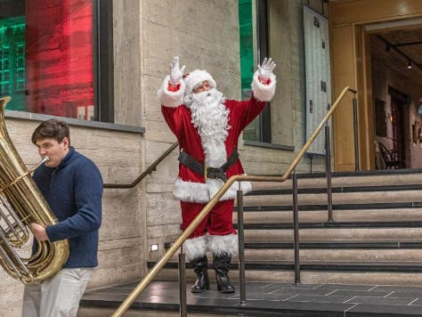 Santa arrives at the museum.