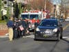 A West Point Military vehicle passes New Hope Borough Police Officers.