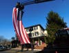 A giant flag flew over South Main Street at the Logan Inn to welcome the West Point Marathon Team to town.