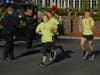 West Point Marathon Team members carry the game ball past the Logan Inn.