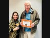 Jack Young of Doylestown, a NO BULLying Run participant in the 80+ age category, receives his award certificate for logging the most miles in his age category from Jaime Valleley, NOVA’s event coordinator.  
