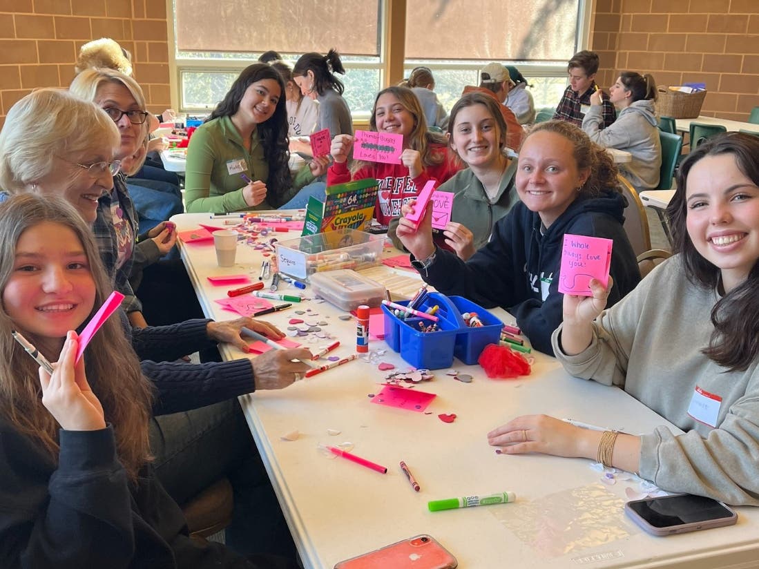 Assembling hygiene kits during the Day of Service.