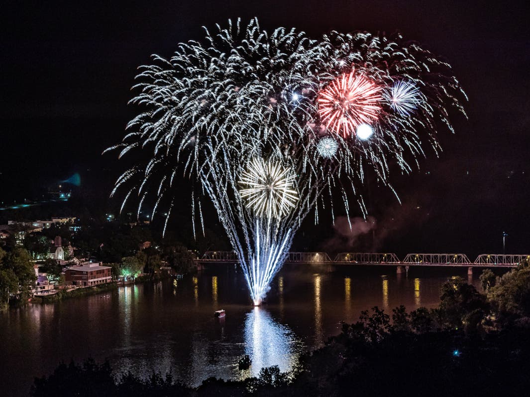 Fireworks explode over the Delaware River between New Hope and Lambertville.