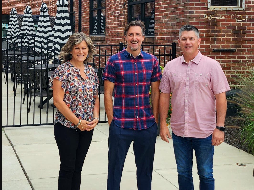 From left are Corinna Garis, marketing lead for Dublin Town Center; Keith Fenimore, founder of Main St.; and Nehemiah CEO Rob Loughery.