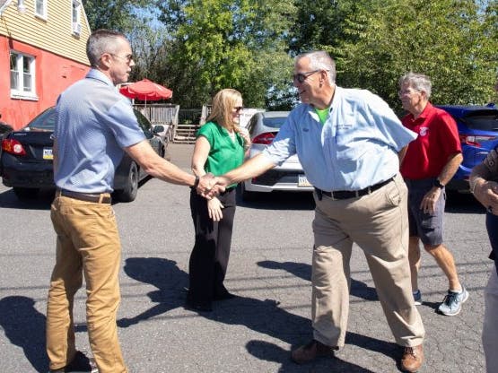 Senator Santarsiero greets Plumstead Township Director of Public Works Alan Bleam.
