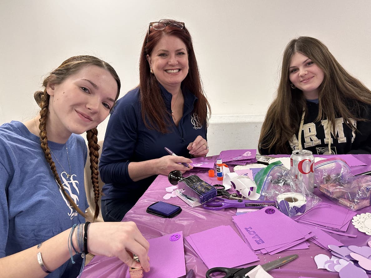 Volunteers with the Central Bucks Chapter of the National Charity League work on the Valentine's Day project.