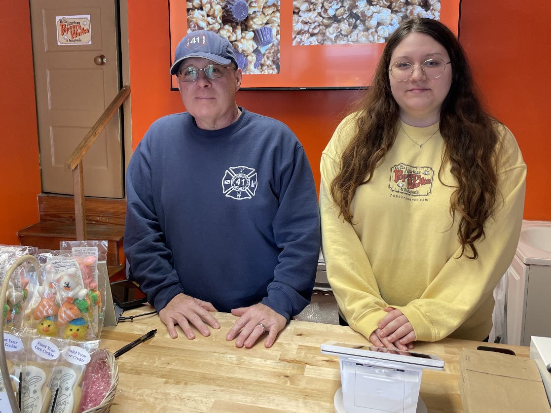 Scott Fleischer with his daughter at the new Great American Popcorn Works of Pennsylvania in Doylestown.