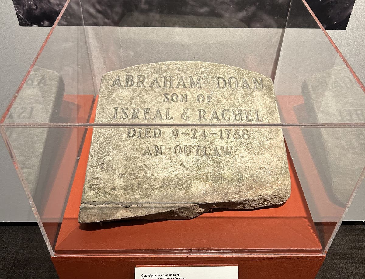 Abraham Doan grave marker inside "The Doan Gang: Outlaws of the Revolution exhibition."
