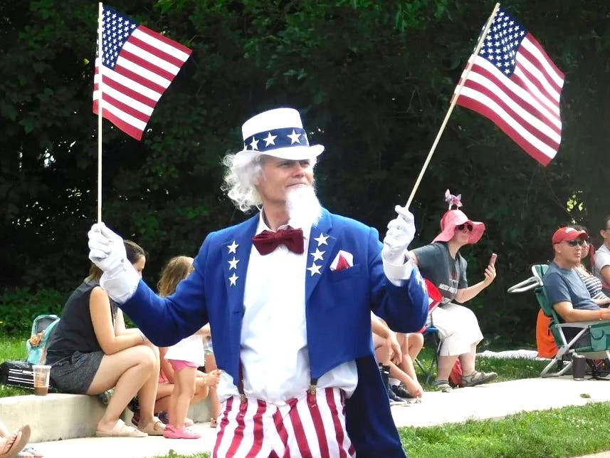 Uncle Sam marches through New Britain during the 2023 Tri-Municipal Parade.