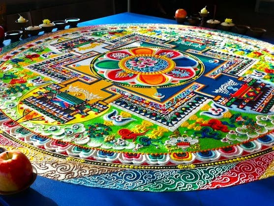 A sacred sand mandala created by the monks.