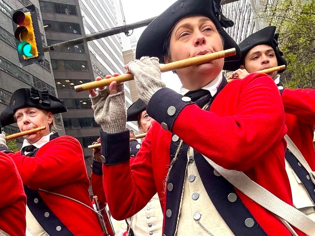 The Washington Crossing Fifes and Drums parade through Philadelphia.