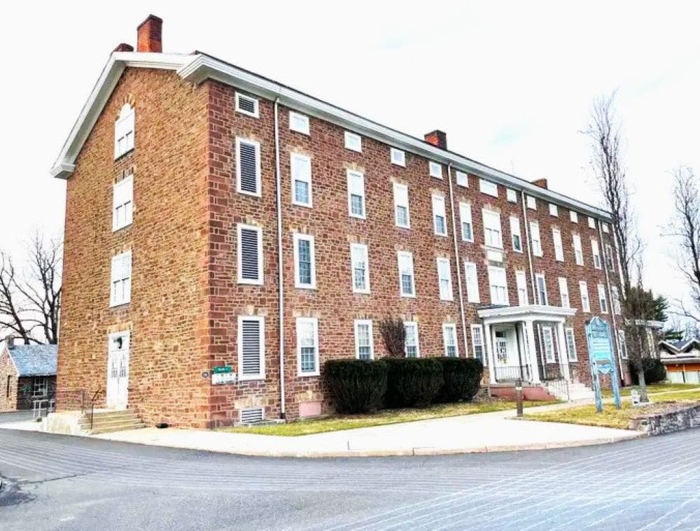 The historic Almshouse building, built in 1809 as a home for orphans and impoverished and aged individuals.