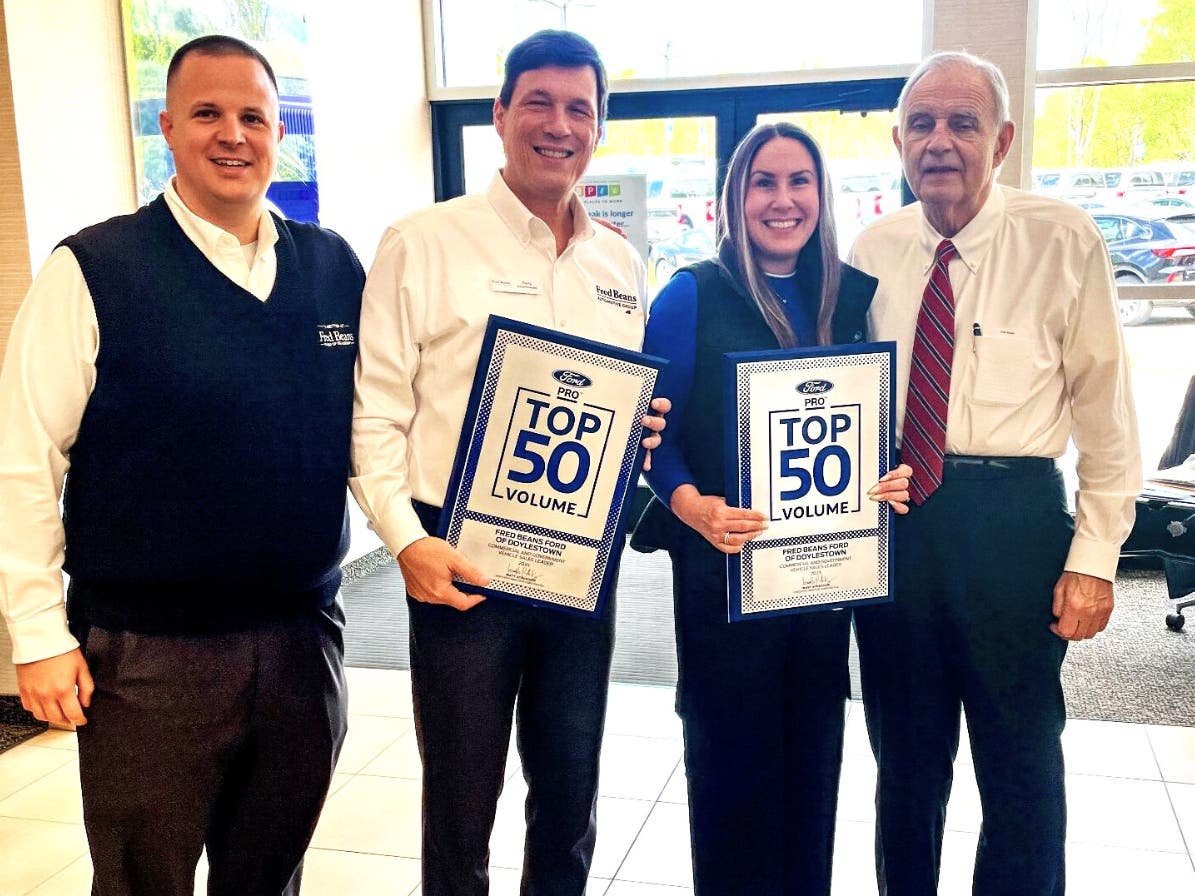 Accepting the Top 50 Volume Dealer awards are Mark Banas, commercial truck manager; Tony Satterthwaite, general manager; Cynthia Dobbins, commercial business manager in the NY/Philadelphia Market for Ford Pro; and Fred Beans, owner of Fred Beans.