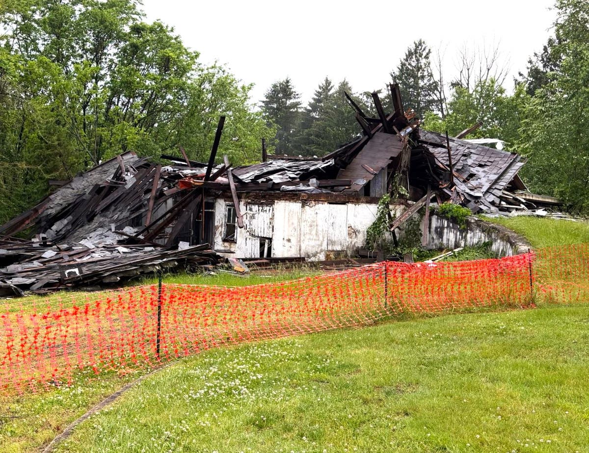 The collapsed barn at Highland Farms.