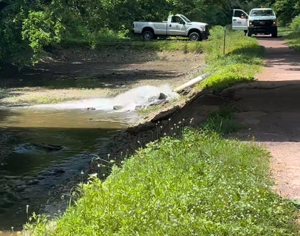 Water gushes back into the historic Delaware Canal in Lumberville.