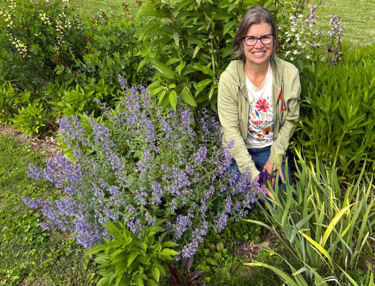 Amy Smith in her backyard garden in Newtown.