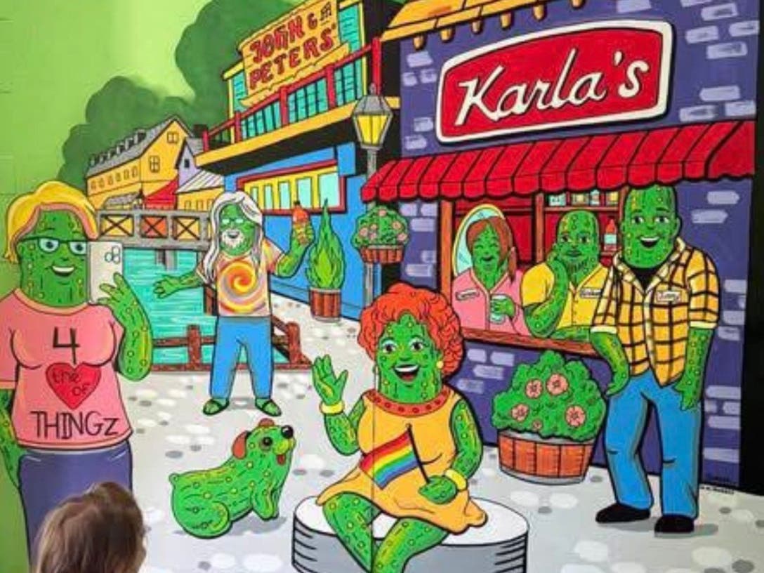 A mural of New Hope decorates a wall inside the new pickle store.