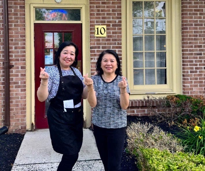 Cindy Tam, right, and her sister, Marina, outside of Ota-Ya.