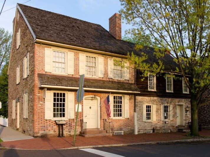 The historic Half-Moon Inn at Court Street and Centre Avenue in Newtown.