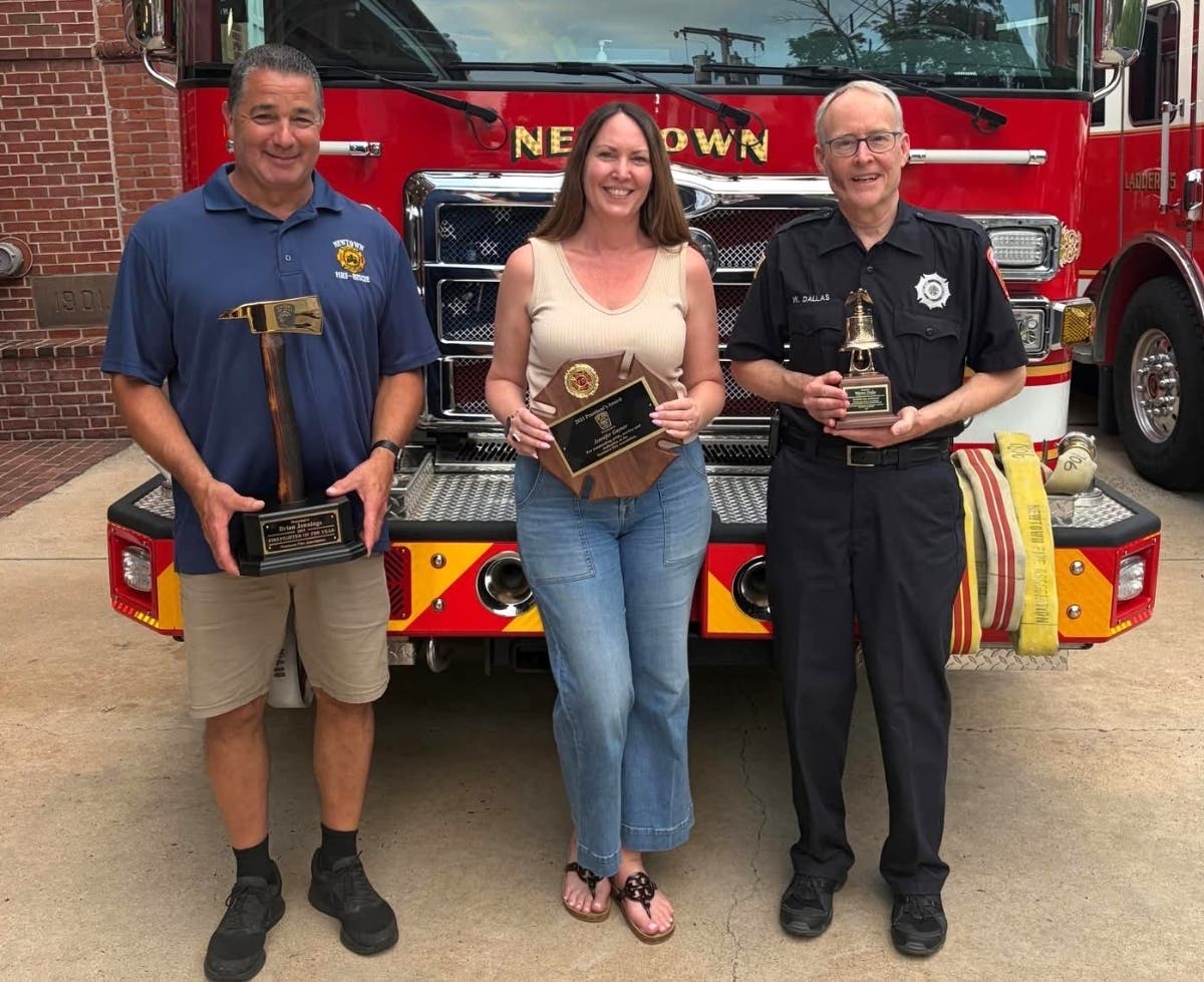 Recognized with awards at the event are, from left, Brian Jennings (Firefighter of the Year), Jennifer Gaynor (President's Award) and Warren Dallas (Chief's Award).