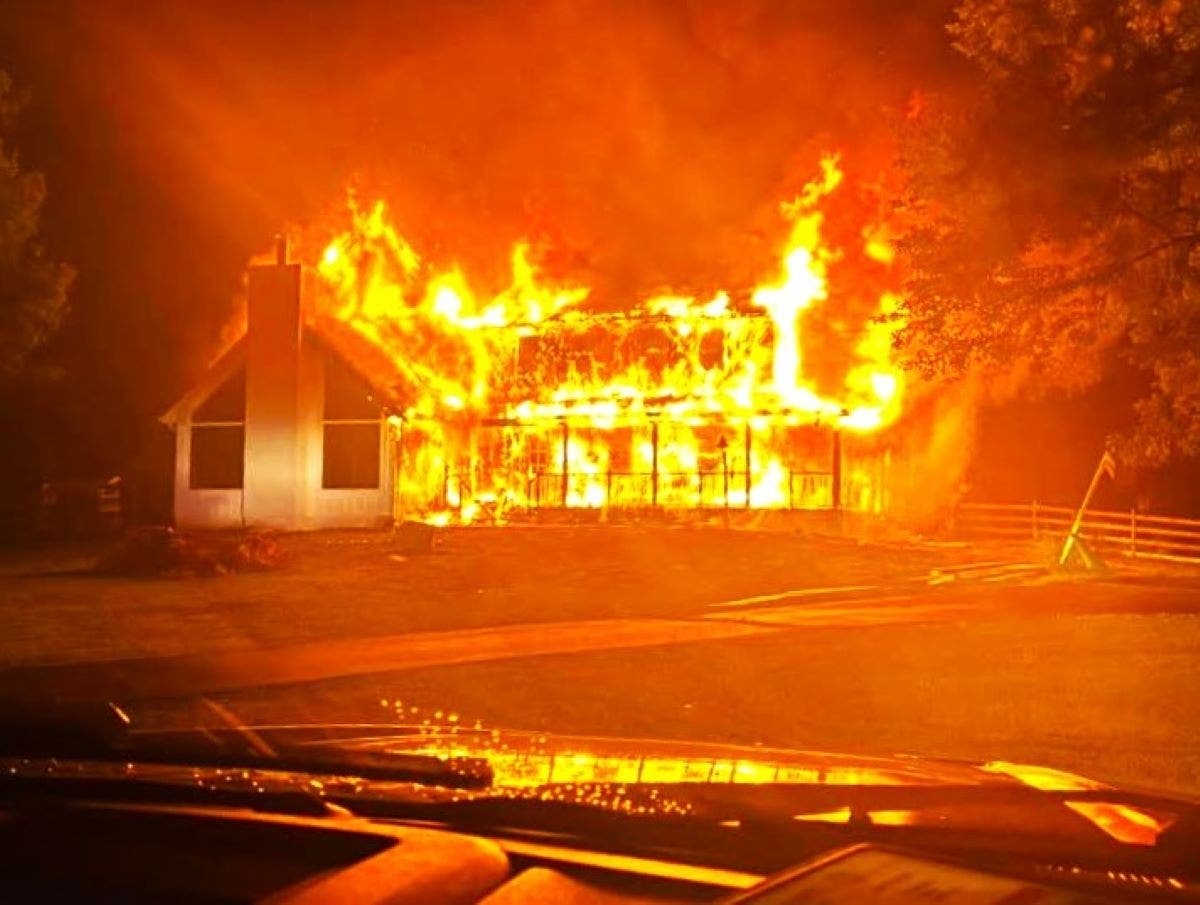 Flames engulf a single-family home on Cherry Lane in Wrightstown Township.