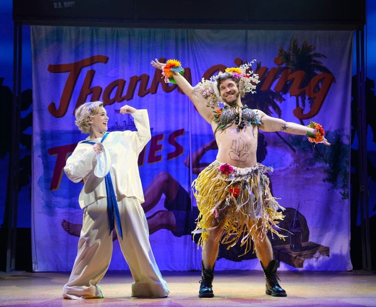 Alexandra Socha as Nellie Forbush and Taylor Crousore as Luther Billis in “Rodgers & Hammerstein’s South Pacific” at Bucks County Playhouse through July 26.