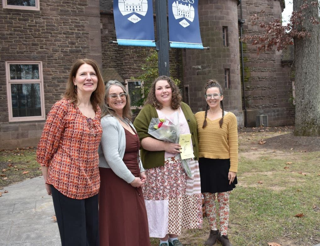 Outside historic Tyler Hall at the 2025 reception are (from left) runners-up Lynn Fanok and Tricia Coscia, 2025 Poet Laureate Madeline Marriott, and 2024 Poet Laureate Lake Angela.